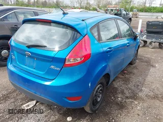 2013 Ford Fiesta SE with VIN 3FADP4EJ0DM158451, listed as a IAAI auction lot 42083743 with 111,919 mi miles. Bid and sale history available at carsss.com. Image 4.