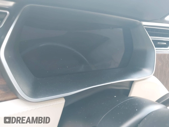 2017 Tesla Model S 100D with VIN 5YJSA1E28HF217489, listed as a IAAI auction lot 42128388 with Not provided miles and . Bid and sale history available at DreamBid. Image 7.