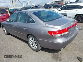 2006 Hyundai Azera SE with VIN KMHFC46F06A107049, listed as a IAAI auction lot 42638717 with 158,094 mi miles and . Bid and sale history available at DreamBid. Image 3.
