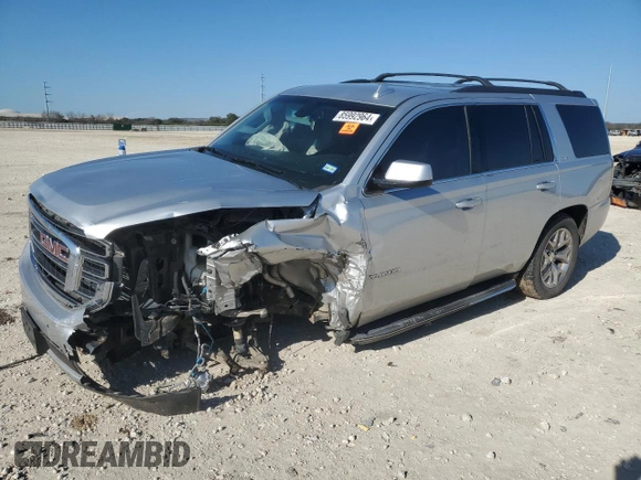 2015 GMC Yukon SLE with VIN 1GKS1AKC1FR716322, listed as a Copart auction lot 85992964 with 141,552 mi miles and Salvage Title. Bid and sale history available at carsss.com. Image 1.