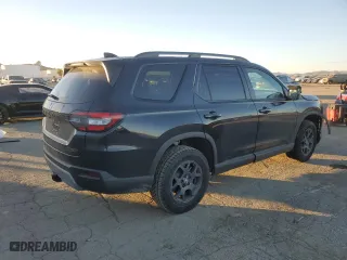 2025 Honda Pilot TrailSport with VIN 5FNYG1H65SB067792, listed as a Copart auction lot 87957615 with 4,470 mi miles and Salvage Title. Bid and sale history available at carsss.com. Image 3.