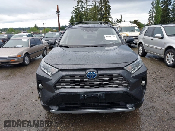 2021 Toyota RAV4 Hybrid XSE with VIN 2T3E6RFV4MW004081, listed as a IAAI auction lot 42300195 with 63,238 mi miles and . Bid and sale history available at DreamBid. Image 12.