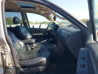 2002 Jeep Grand Cherokee with VIN 1J8GW48N72C207838, listed as a IAAI auction lot 42020294 with 181,283 mi miles and . Bid and sale history available at DreamBid. Image 5.