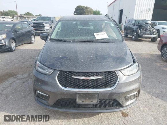 2023 Chrysler Pacifica Hybrid Touring L z VIN 2C4RC1L73PR598923, wystawiony jako IAAI lot #42124867 z przebiegiem 51 173 mil mil oraz . Historia ofert i sprzedaży dostępna na DreamBid. Obrazek 12.