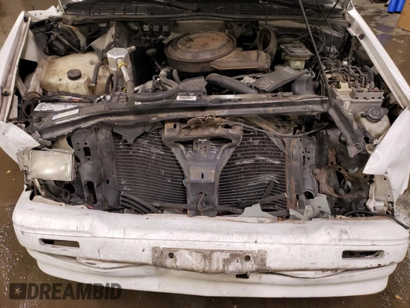1995 GMC Sonoma z VIN 1GTCS14Z9S8537833, wystawiony jako Copart lot #78534234 z przebiegiem 187 729 mil mil oraz Szkoda całkowita • Salvage title. Historia ofert i sprzedaży dostępna na DreamBid. Obrazek 11.