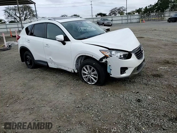 2016 Mazda CX-5 Touring with VIN JM3KE2CY5G0838663, listed as a Copart auction lot 47658065 with 51,470 mi miles and Salvage Title. Bid and sale history available at carsss.com. Image 12.