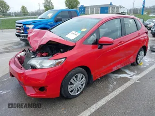2016 Honda Fit LX with VIN JHMGK5H59GS008911, listed as a IAAI auction lot 42002981 with 96,224 mi miles and . Bid and sale history available at DreamBid. Image 2.