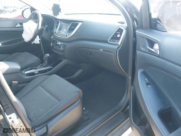 2017 Hyundai Tucson Value with VIN KM8J33A24HU343231, listed as a IAAI auction lot 41395327 with 133,017 mi miles. Bid and sale history available at carsss.com. Image 5.