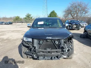 2014 Jeep Grand Cherokee Overland with VIN 1C4RJECG4EC523747, listed as a IAAI auction lot 40802143 with 124,079 mi miles. Bid and sale history available at carsss.com. Image 12.