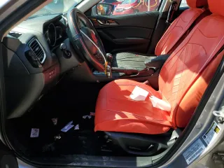2016 Mazda 3 S Touring with VIN JM1BM1M3XG1293384, listed as a Copart auction lot 55459765 with 67,481 mi miles and Salvage title. Bid and sale history available at DreamBid. Image 7.