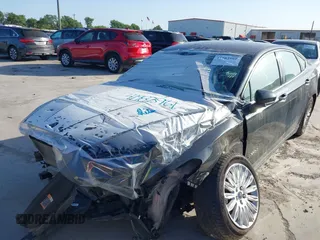2015 Ford Fusion S Hybrid with VIN 3FA6P0UU9FR106402, listed as a IAAI auction lot 41983961 with 27,122 mi miles. Bid and sale history available at carsss.com. Image 2.