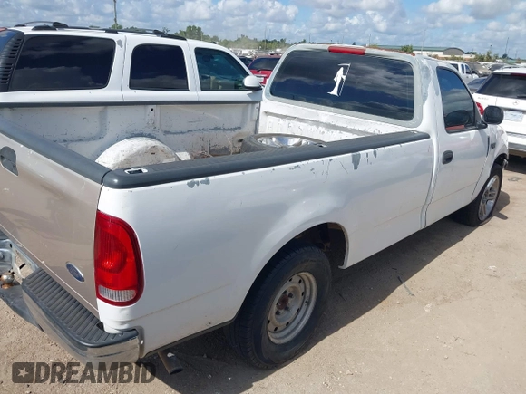 1998 Ford F-150 with VIN 1FTZF1729WKB83429, listed as a IAAI auction lot 42549303 with 173,426 mi miles and . Bid and sale history available at DreamBid. Image 4.