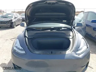 2023 Tesla Model Y Long Range with VIN 7SAYGDEE5PA035722, listed as a IAAI auction lot 41726067 with 34,357 mi miles. Bid and sale history available at carsss.com. Image 10.