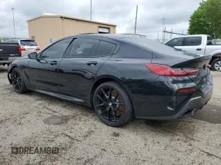 2022 BMW 8 Series M850i z VIN WBAGV8C02NCK08667, wystawiony jako Copart lot #55632805 z przebiegiem 22 737 mil mil oraz Szkody całkowita. Historia ofert i sprzedaży dostępna na DreamBid. Obrazek 2.