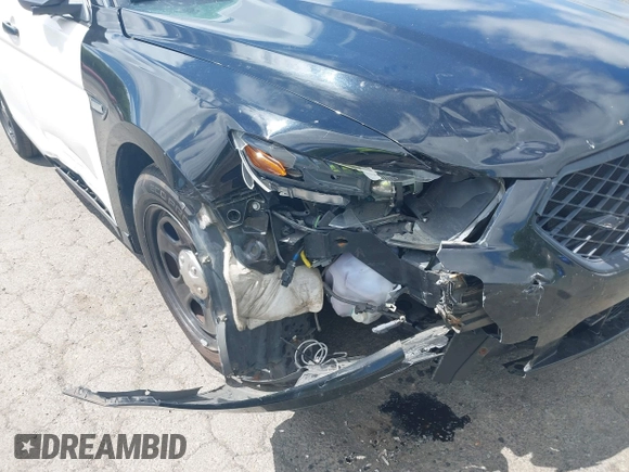 2014 Ford Police Interceptor with VIN 1FAHP2MKXEG185863, listed as a IAAI auction lot 42297860 with 115,188 mi miles and . Bid and sale history available at DreamBid. Image 6.