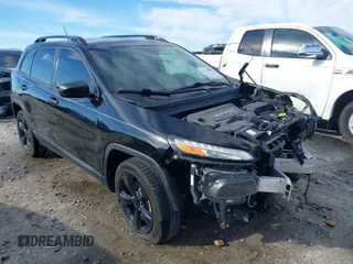 2017 Jeep Cherokee Sport with VIN 1C4PJLABXHW641176, listed as a IAAI auction lot 41592050 with 97,930 mi miles. Bid and sale history available at carsss.com. Image 1.