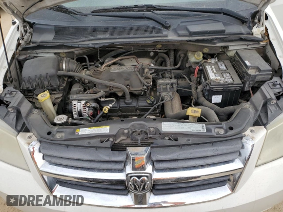 2010 Dodge Grand Caravan SXT z VIN 2D4RN5D12AR354539, wystawiony jako Copart lot #53935695 z przebiegiem 157 100 mil mil oraz Czysty tytuł • Clean title. Historia ofert i sprzedaży dostępna na DreamBid. Obrazek 12.