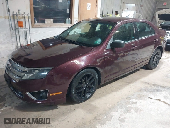 2011 Ford Fusion SEL with VIN 3FAHP0JA6BR201870, listed as a IAAI auction lot 42159069 with 157,656 mi miles. Bid and sale history available at carsss.com. Image 2.