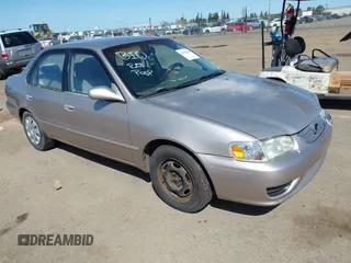 2001 Toyota Corolla CE with VIN 1NXBR12E51Z541564, listed as a IAAI auction lot 41956248 with 220,582 mi miles and . Bid and sale history available at DreamBid. Image 1.