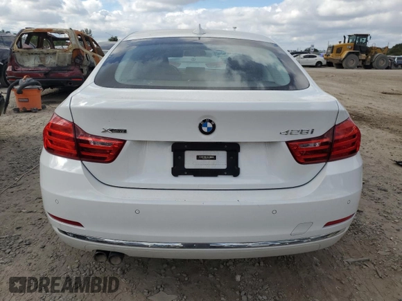 2015 BMW 4 Series 428i xDrive with VIN WBA4C9C53FG135314, listed as a Copart auction lot 82090253 with 93,188 mi miles and . Bid and sale history available at DreamBid. Image 6.