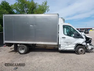 2023 Ford Transit with VIN 1FDBF6ZG4PKA14505, listed as a IAAI auction lot 42090749 with Not provided miles and . Bid and sale history available at DreamBid. Image 14.
