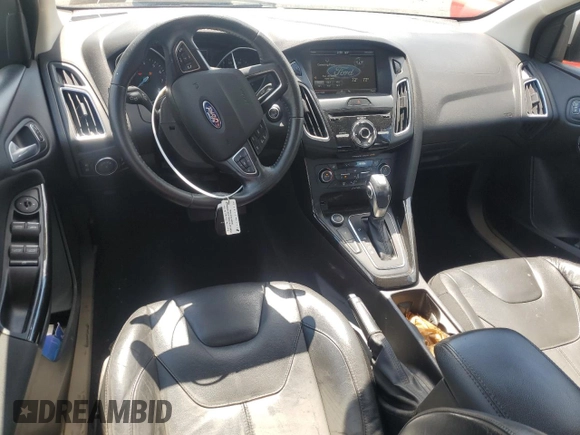 2015 Ford Focus Titanium with VIN 1FADP3J27FL267339, listed as a Copart auction lot 63395835 with 73,372 mi miles and Salvage title. Bid and sale history available at DreamBid. Image 8.