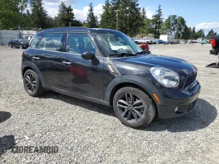2013 MINI Countryman S ALL4 z VIN WMWZC5C56DWP33270, wystawiony jako Copart lot #56804085 z przebiegiem 141 637 mil mil oraz Szkoda całkowita • Salvage title. Historia ofert i sprzedaży dostępna na DreamBid. Obrazek 4.
