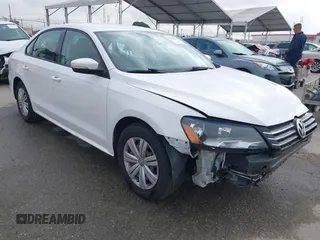 2014 Volkswagen Passat S with VIN 1VWAS7A34EC120855, listed as a IAAI auction lot 42134586 with 61,825 mi miles and . Bid and sale history available at DreamBid. Image 1.