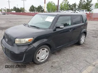 2009 Scion xB with VIN JTLKE50E791068407, listed as a IAAI auction lot 42075744 with 199,789 mi miles. Bid and sale history available at carsss.com. Image 2.
