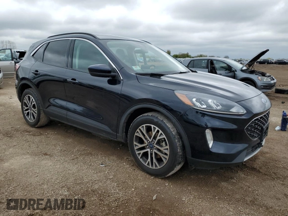 2021 Ford Escape SEL with VIN 1FMCU9H63MUB35918, listed as a Copart auction lot 55647305 with 211,681 mi miles and Salvage title. Bid and sale history available at DreamBid. Image 4.
