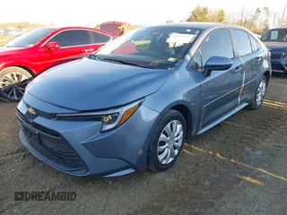 2023 Toyota Corolla Hybrid LE with VIN JTDBDMHE2P3004712, listed as a IAAI auction lot 41235157 with 79,581 mi miles. Bid and sale history available at carsss.com. Image 2.