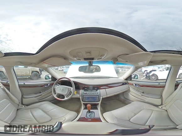 2003 Cadillac DeVille DTS z VIN 1G6KF57993U201484, wystawiony jako Copart lot #43742375 z przebiegiem 53 478 mil mil oraz Szkody całkowita. Historia ofert i sprzedaży dostępna na DreamBid. Obrazek 12.