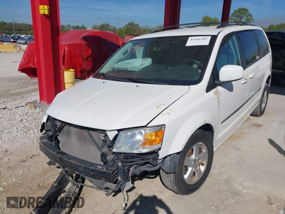 2010 Dodge Grand Caravan SXT with VIN 2D4RN5D1XAR462150, listed as a IAAI auction lot 41466381 with 204,531 mi miles and . Bid and sale history available at DreamBid. Image 2.