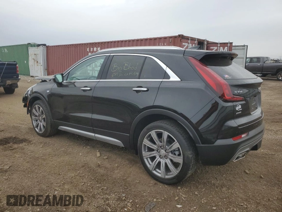 2022 Cadillac XT4 AWD Premium Luxury with VIN 1GYFZDR43NF132553, listed as a Copart auction lot 50869955 with 25,412 mi miles and Salvage title. Bid and sale history available at DreamBid. Image 2.