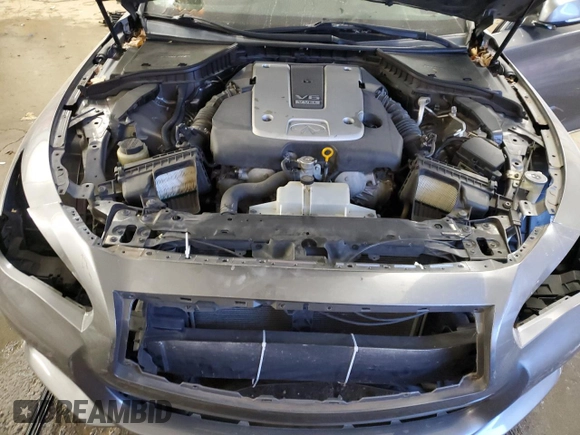 2015 Infiniti Q50 Premium with VIN JN1BV7AP8FM337048, listed as a Copart auction lot 83052064 with 128,640 mi miles and Salvage Title. Bid and sale history available at carsss.com. Image 11.