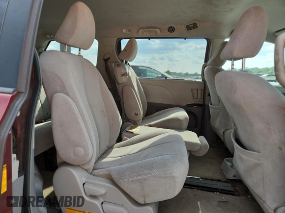 2013 Toyota Sienna LE AAS z VIN 5TDKK3DC6DS362510, wystawiony jako Copart lot #65827725 z przebiegiem 175 045 mil mil oraz Czysty tytuł • Clean title. Historia ofert i sprzedaży dostępna na DreamBid. Obrazek 11.