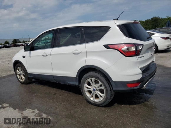 2017 Ford Escape SE z VIN 1FMCU0GD9HUE38848, wystawiony jako Copart lot #56859745 z przebiegiem 69 404 mil mil oraz Szkoda całkowita • Salvage title. Historia ofert i sprzedaży dostępna na DreamBid. Obrazek 2.