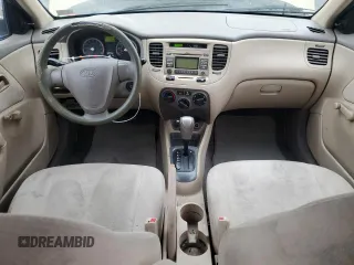 2009 Kia Rio LX with VIN KNADE223096485561, listed as a Copart auction lot 73412874 with 137,858 mi miles and Salvage Title. Bid and sale history available at DreamBid. Image 8.