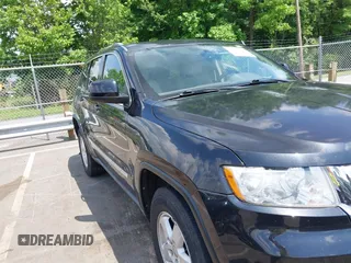2011 Jeep Grand Cherokee Laredo with VIN 1J4RS4GG5BC534960, listed as a IAAI auction lot 42277395 with 223,690 mi miles and . Bid and sale history available at DreamBid. Image 6.