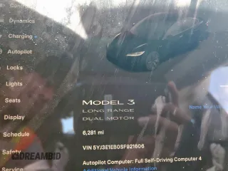 2025 Tesla Model 3 Long Range with VIN 5YJ3E1EB0SF921606, listed as a Copart auction lot 60728995 with 6,281 mi miles and Salvage title. Bid and sale history available at DreamBid. Image 9.
