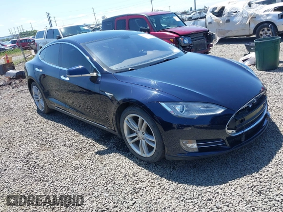 2014 Tesla Model S 60 with VIN 5YJSA1H18EFP31969, listed as a IAAI auction lot 42312485 with 90,043 mi miles and . Bid and sale history available at DreamBid. Image 1.