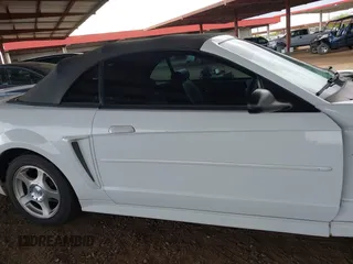 2004 Ford Mustang Deluxe with VIN 1FAFP446X4F133790, listed as a IAAI auction lot 41950759 with 133,734 mi miles. Bid and sale history available at carsss.com. Image 14.