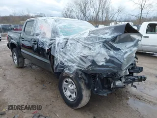 2023 Toyota Tacoma SR with VIN 3TMCZ5AN9PM555191, listed as a IAAI auction lot 41935645 with 31,580 mi miles and . Bid and sale history available at DreamBid. Image 1.