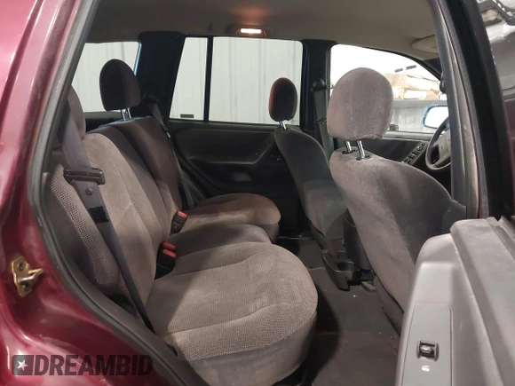 2000 Jeep Grand Cherokee Laredo z VIN 1J4GW48N8YC151600, wystawiony jako IAAI lot #42178535 z przebiegiem 71 207 mil mil oraz . Historia ofert i sprzedaży dostępna na DreamBid. Obrazek 8.