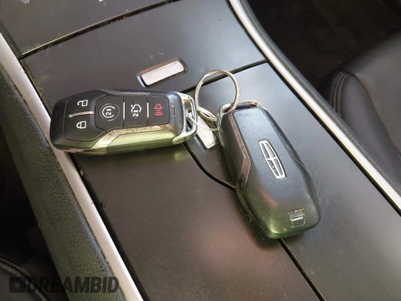 2015 Lincoln MKZ Hybrid with VIN 3LN6L2LU3FR614329, listed as a IAAI auction lot 41295489 with 103,909 mi miles and . Bid and sale history available at DreamBid. Image 11.