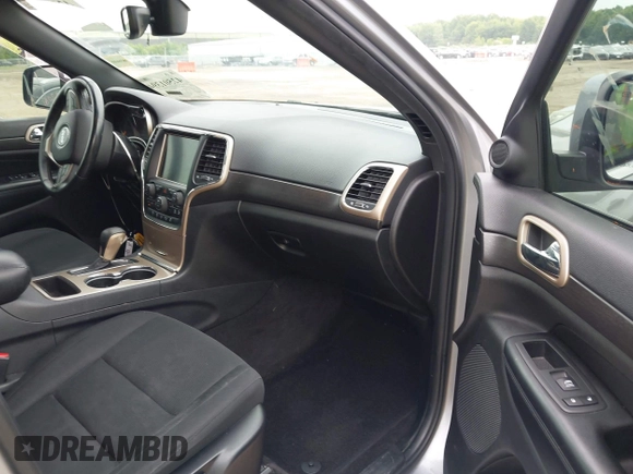 2017 Jeep Grand Cherokee Laredo with VIN 1C4RJFAG3HC963309, listed as a IAAI auction lot 42501394 with 145,315 mi miles and . Bid and sale history available at DreamBid. Image 5.