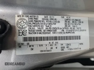 2012 Ford Focus SE with VIN 1FAHP3F2XCL202510, listed as a Copart auction lot 64066545 with 77,828 mi miles and Salvage title. Bid and sale history available at DreamBid. Image 12.