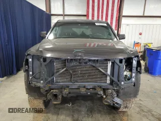 2015 Chevrolet Tahoe LT with VIN 1GNSCBKC3FR112306, listed as a Copart auction lot 51282355 with 136,492 mi miles and Salvage Title. Bid and sale history available at DreamBid. Image 5.