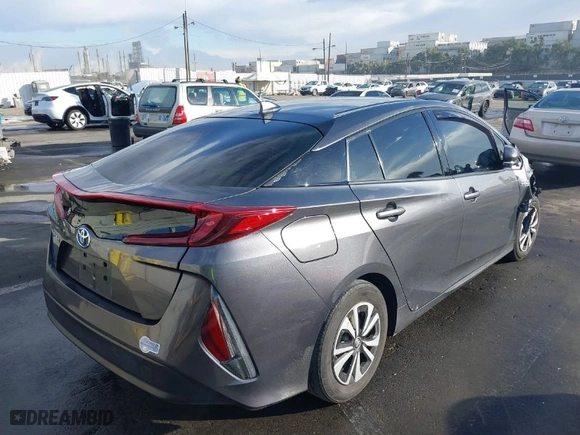 2017 Toyota Prius Prime Plus with VIN JTDKARFP7H3038561, listed as a IAAI auction lot 41266305 with NaN miles. Bid and sale history available at carsss.com. Image 4.