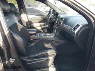 2015 Jeep Grand Cherokee SRT with VIN 1C4RJFDJ9FC842448, listed as a IAAI auction lot 41850385 with 178,439 mi miles. Bid and sale history available at carsss.com. Image 5.